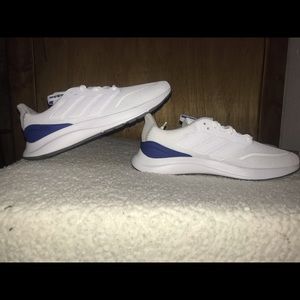 Blue and white Adidas.